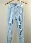 Light Wash Ripped Jeans By Fashion Nova