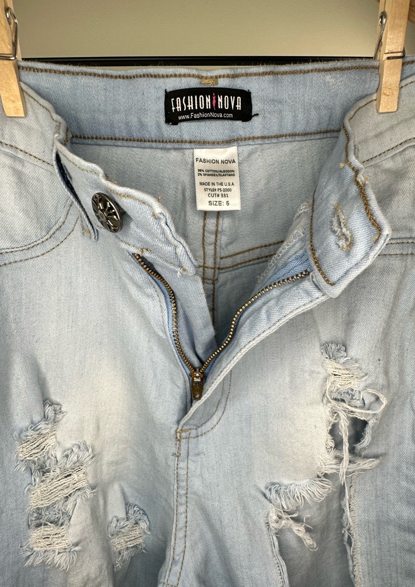 Light Wash Ripped Jeans By Fashion Nova